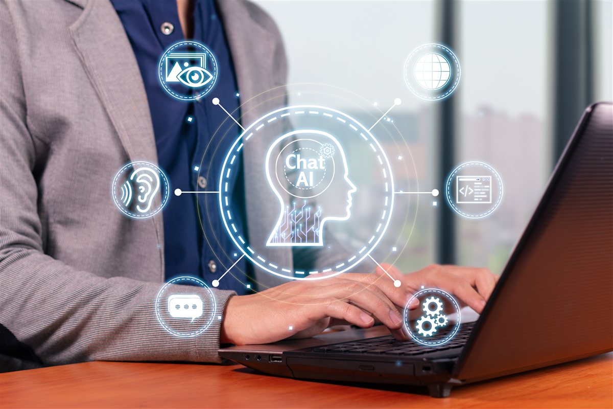 Person typing on a laptop with an AI interface overlay